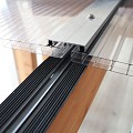 Pext Polycarbonaat Dakpakket - 5060x2500 muuraanbouw - blank aluminium - polycarbonaat helder
